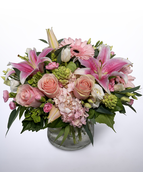 pink arrangement with lilies and roses
