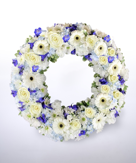 blue and white funeral wreath