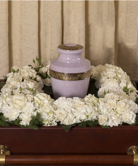urn tribute in elegant white flowers