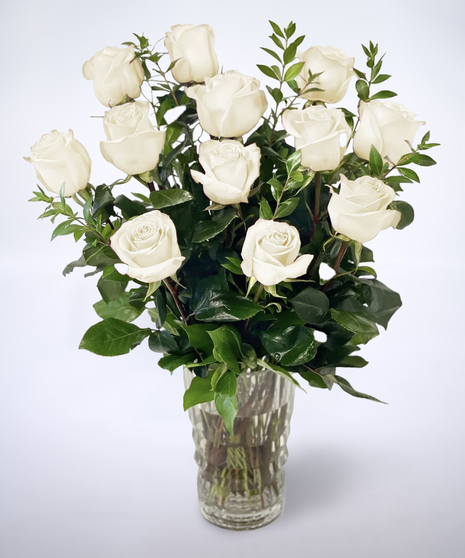 white roses in a vase