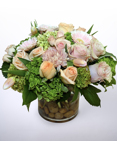 pastel arrangement in peach and pink