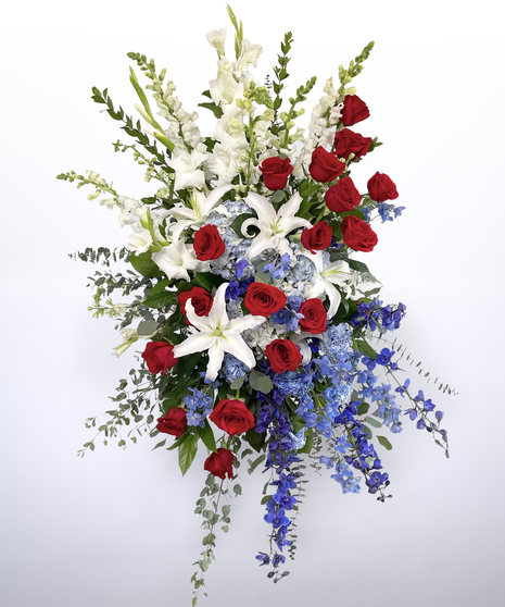 patriotic standing spray with roses and lilies