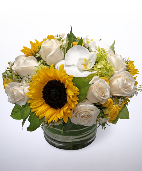 green hydrangea, sunflowers, white roses and white phalaenopsis orchids, accented by lemon leaf greenery