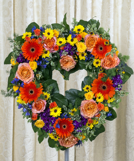 Vivid beauty flowers in a standing funeral open heart