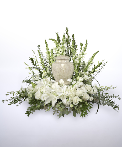 white flower tribute made for cremation urn